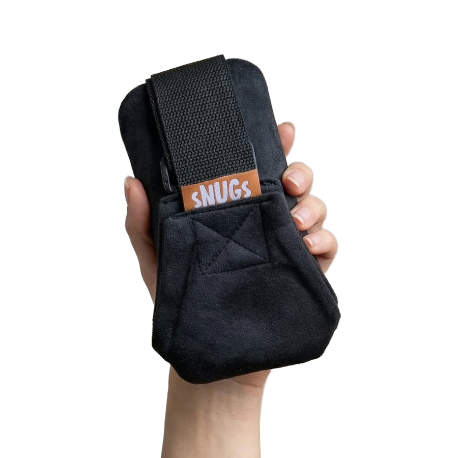 The folded carrier held in one palm